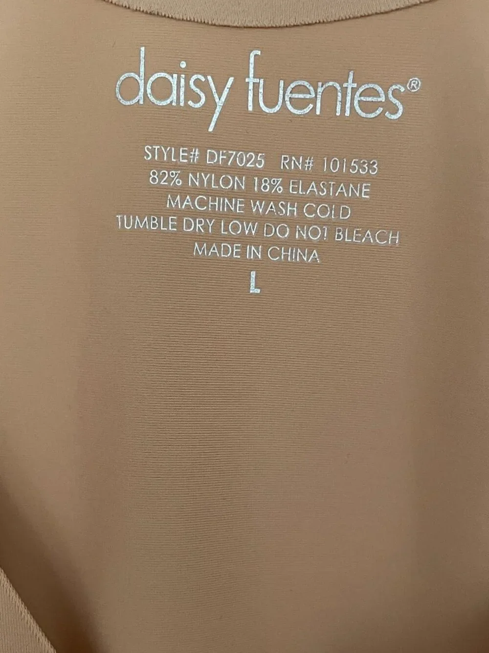 Daisy Fuentes gently worn